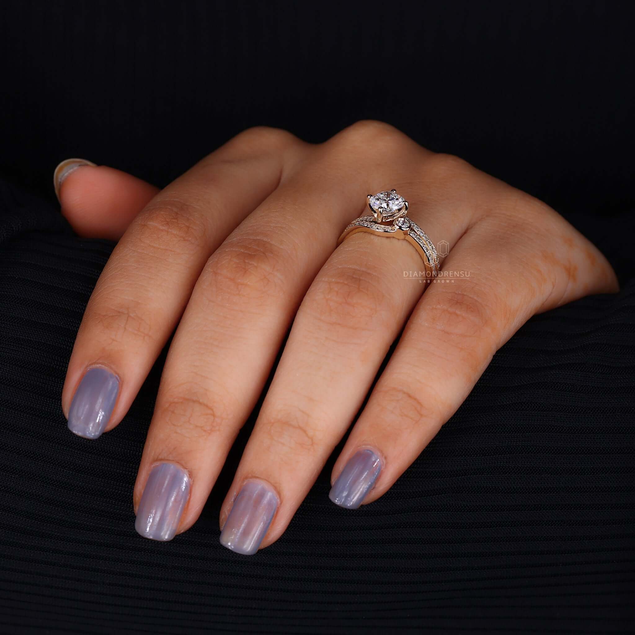 Stunning lab grown diamond bridal set on a velvet cushion, highlighting luxury and eco-conscious choice.