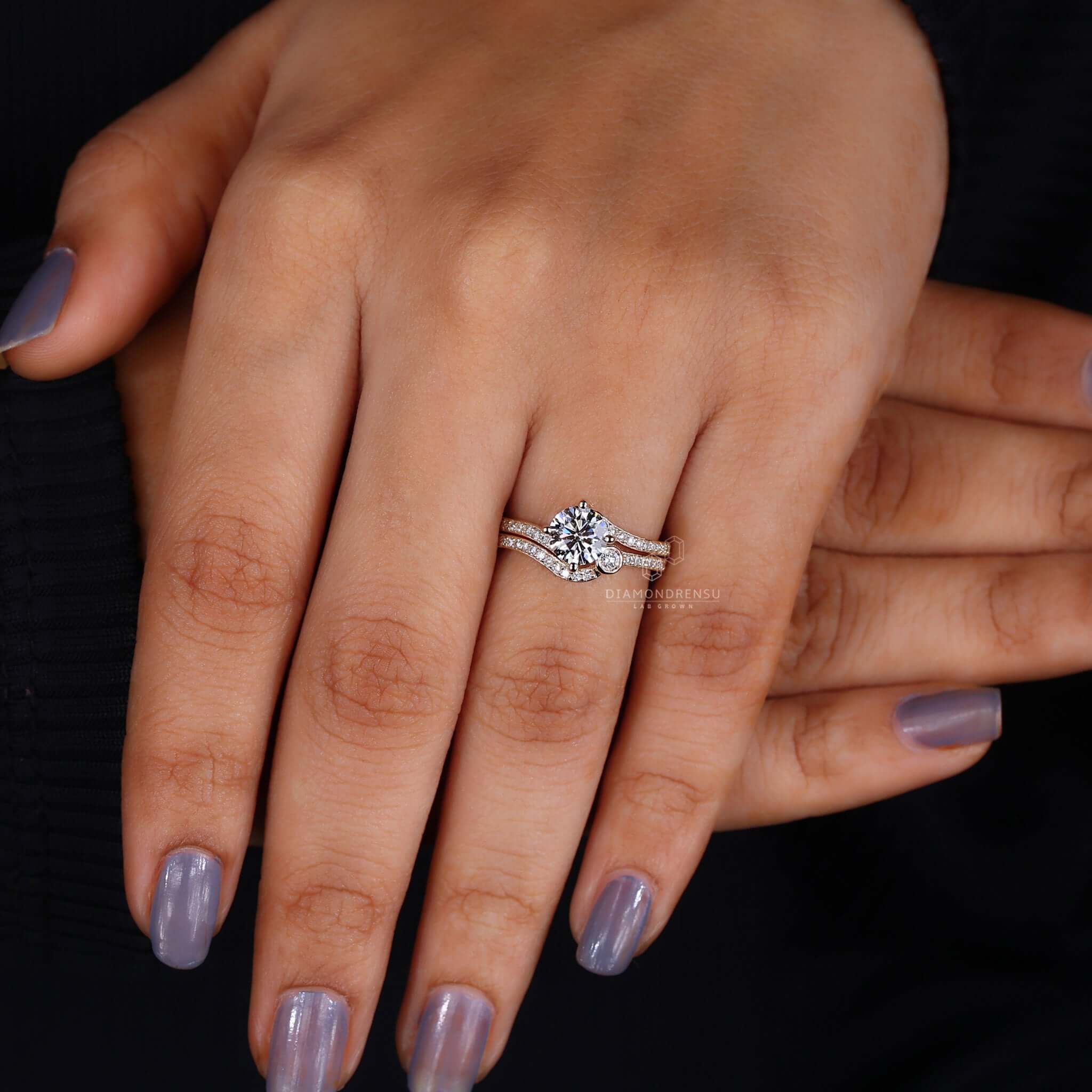 Close-up of a round diamond wedding band on hand, showcasing its brilliant sparkle and fine detail