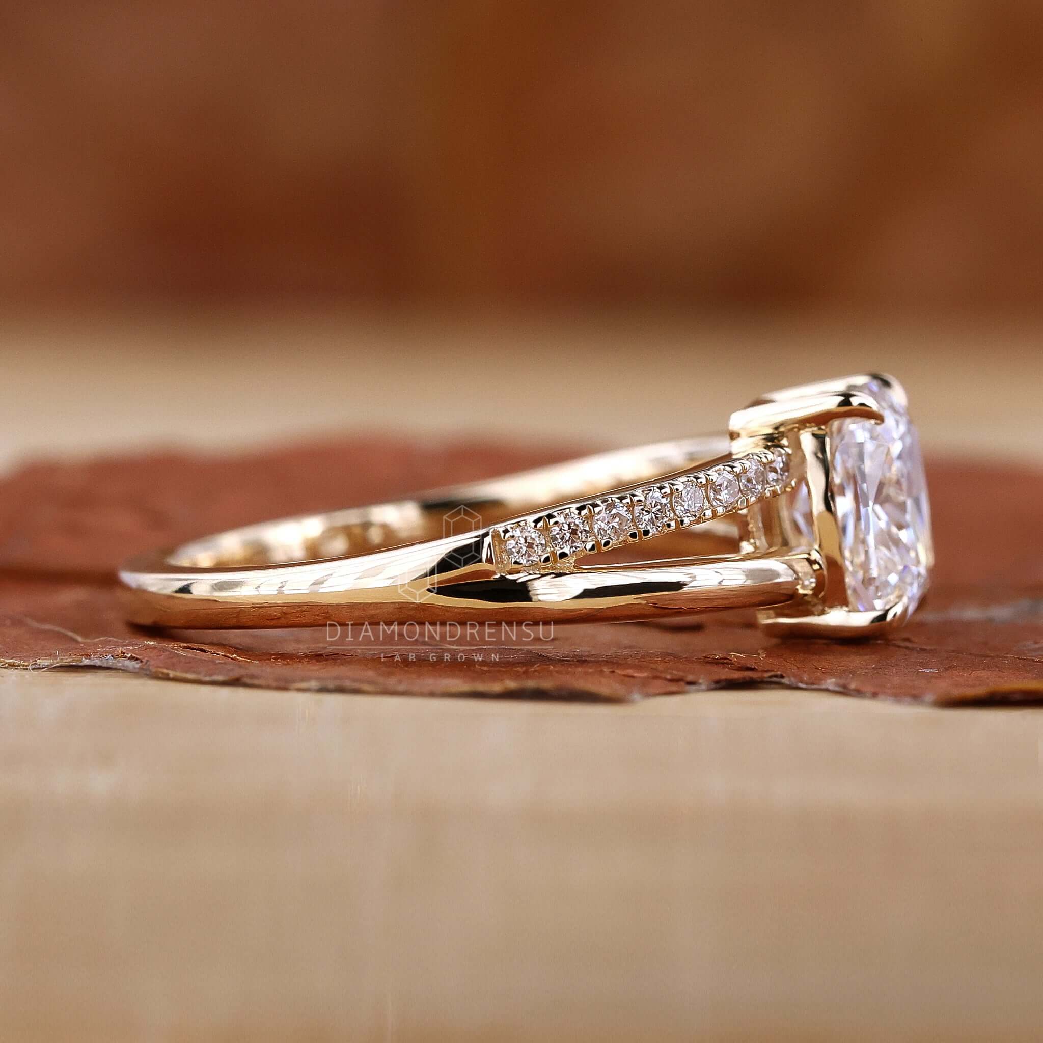 Split shank ring design, adding modern flair to the elongated cushion cut