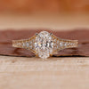 Shimmering Oval Diamond Engagement Ring on Hand, showcasing timeless elegance