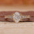 Shimmering Oval Diamond Engagement Ring on Hand, showcasing timeless elegance