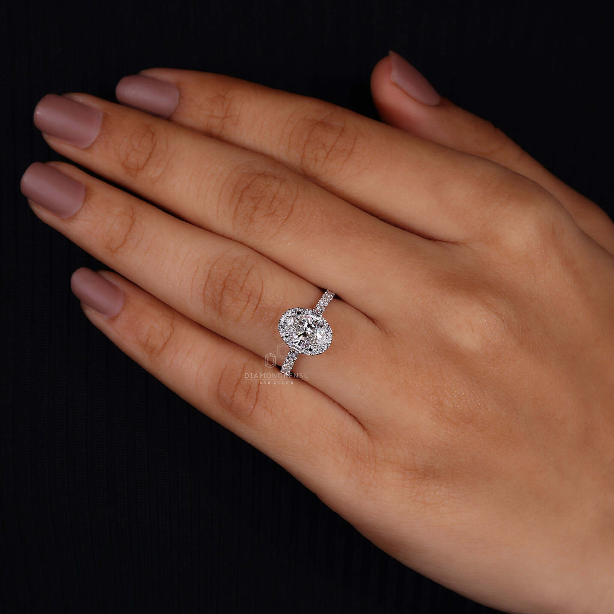 Elegant 1 Carat Oval Diamond Ring on Model's Hand