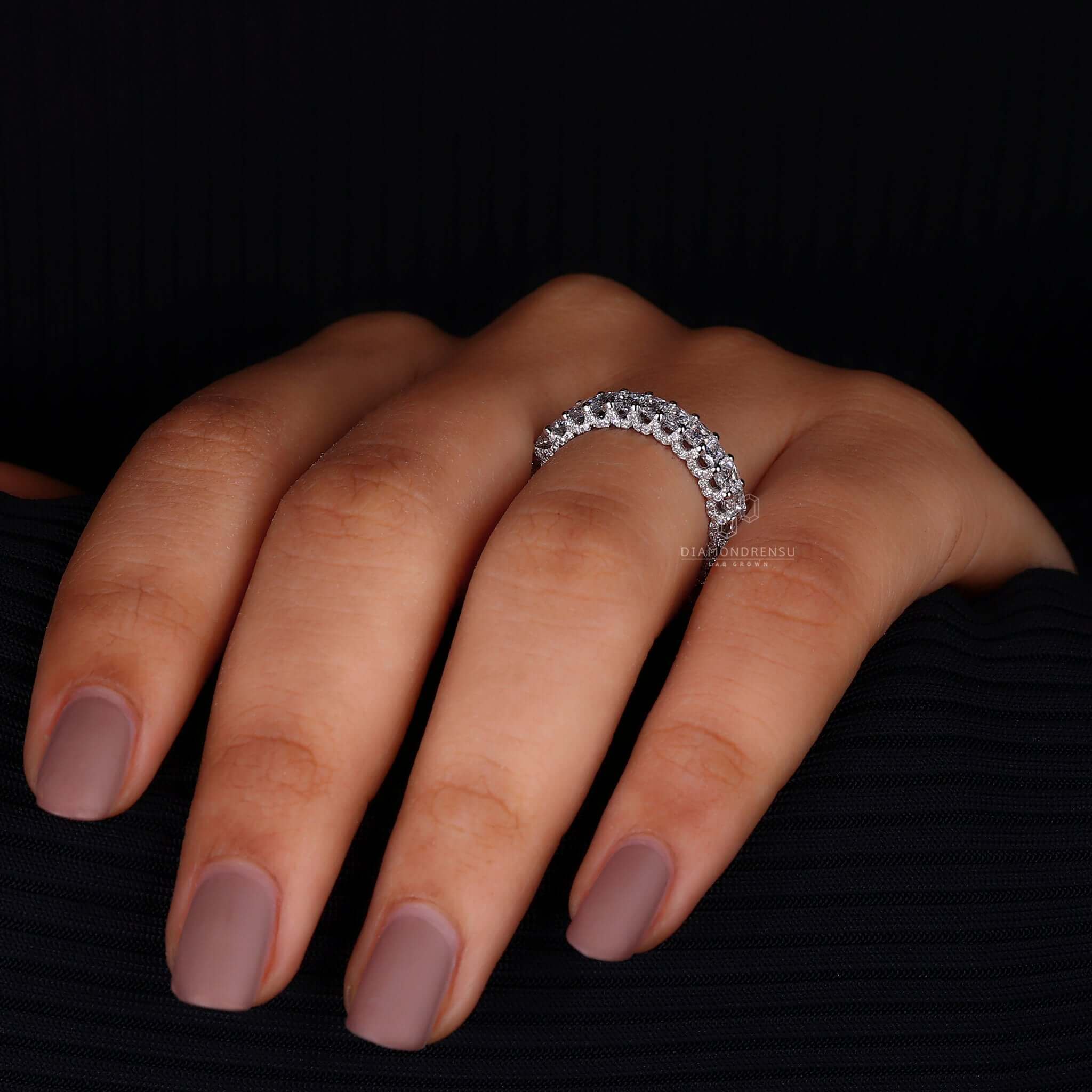 Model showcasing a diamond wedding ring for women with radiant cut diamond