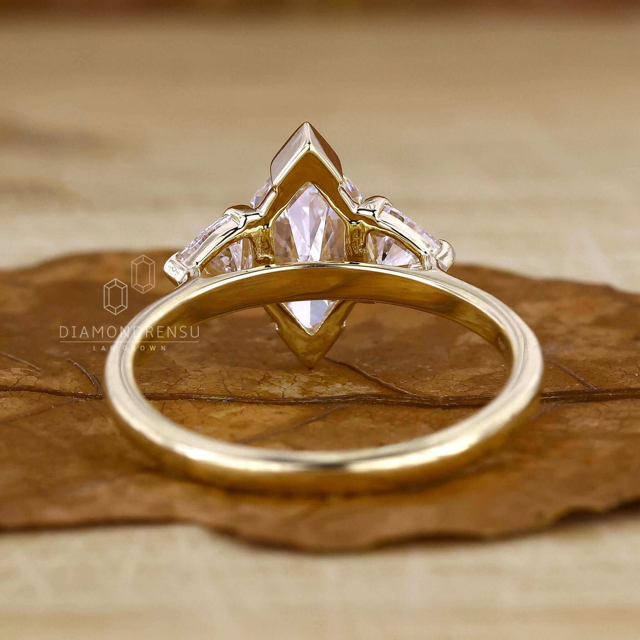 Three stone diamond ring in a jewelry box, ready for gifting.