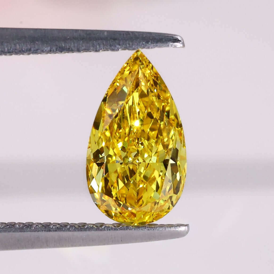 pear cut yellow diamond