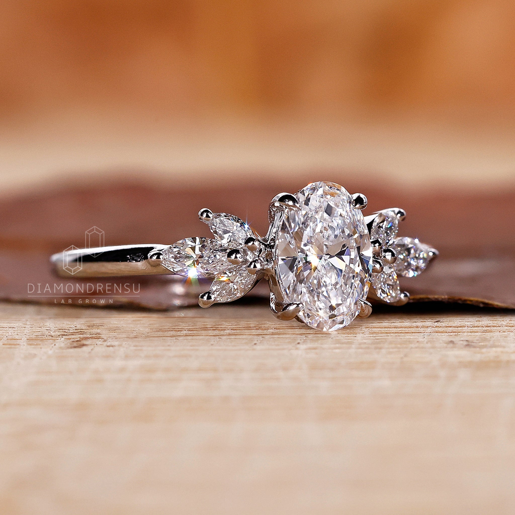 Oval Stirring Lab-Grown Diamond Ring with Marquise Cut Side Stones