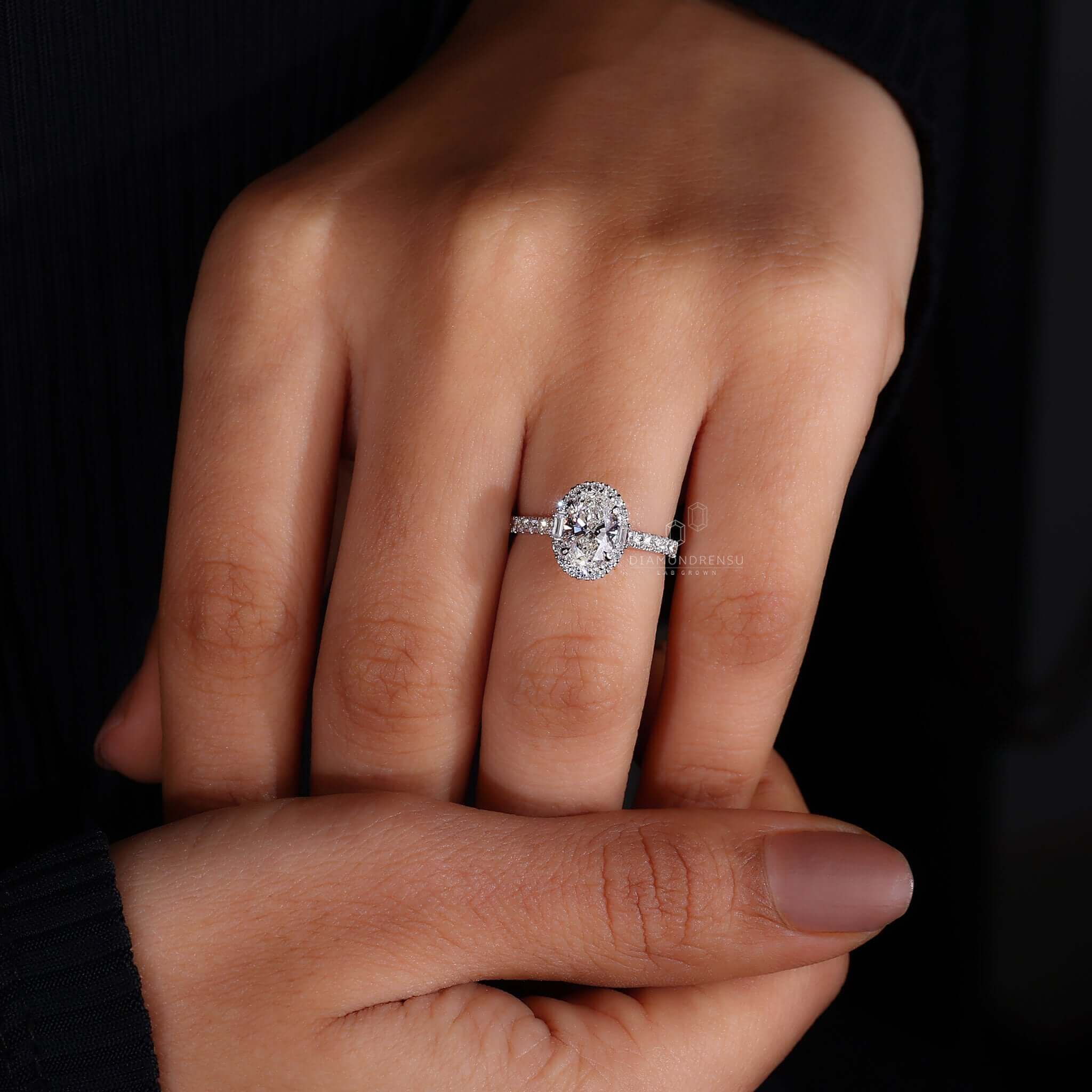 Stunning 1 Carat Oval Diamond Ring on Model's Finger