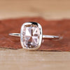 A detailed image showing the intricate bezel setting and cushion rose cut diamond.