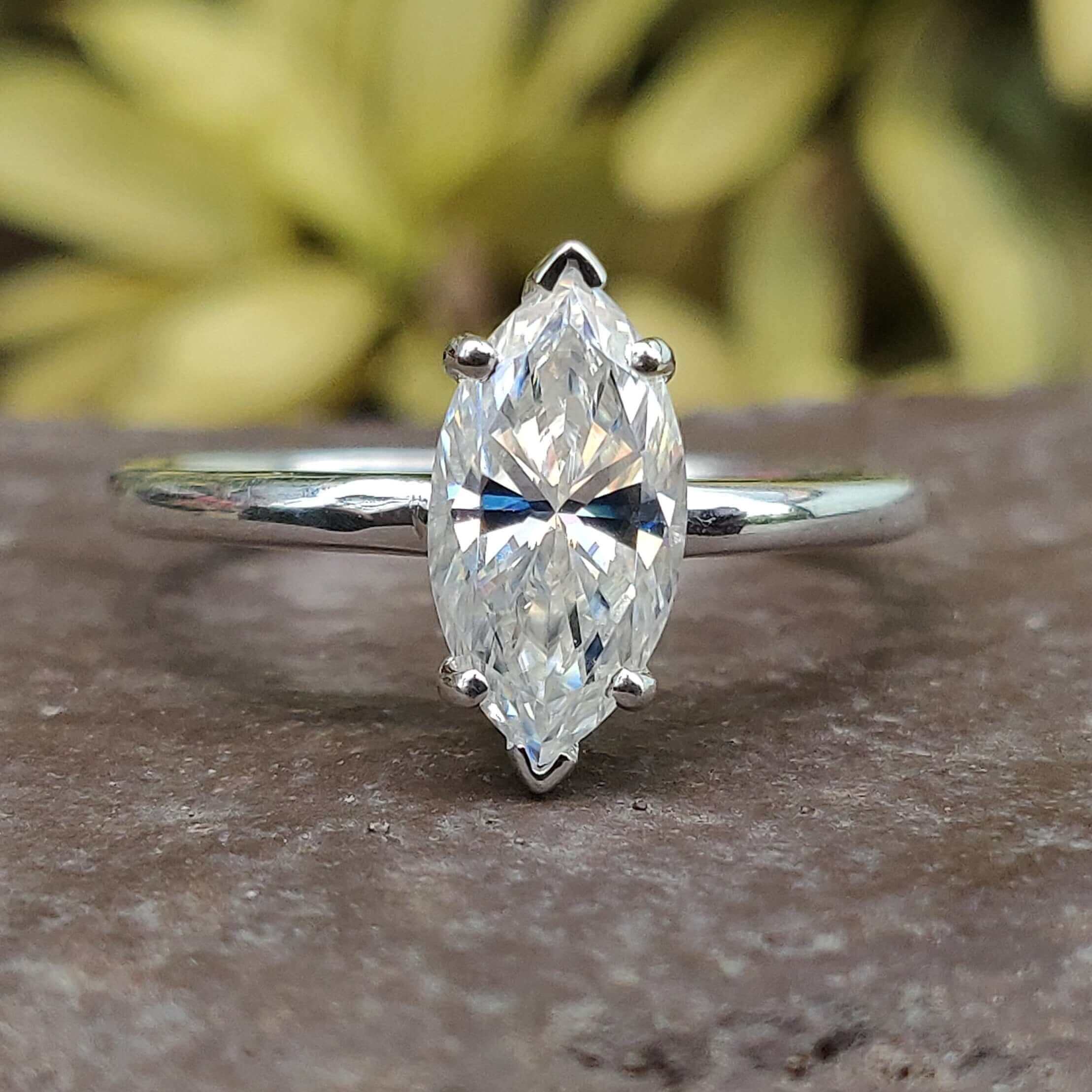 Image of a marquise solitaire engagement ring featuring a stunning 4 prong setting.