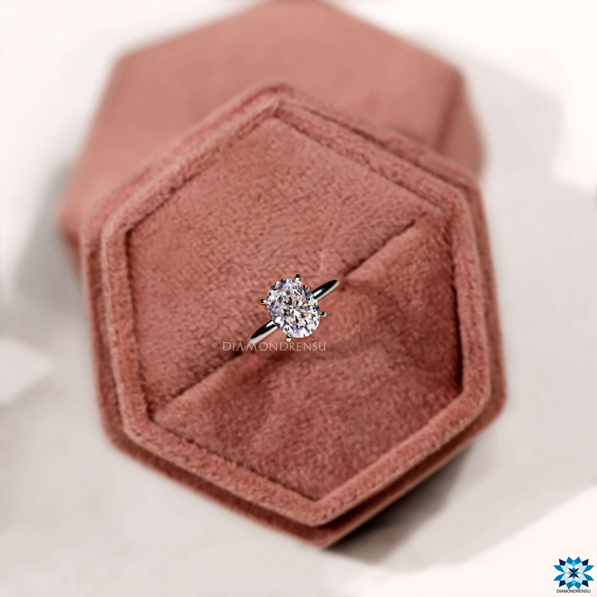 A captivating oval solitaire moissanite engagement ring that sparkles with a radiant center stone, symbolizing everlasting love.
