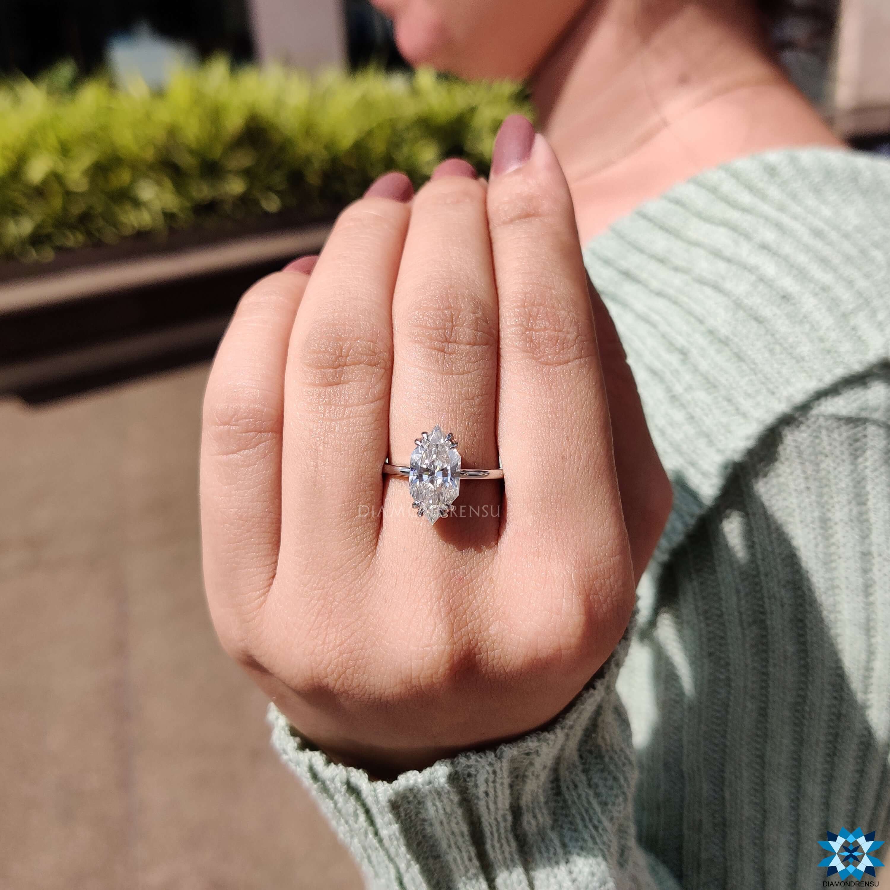 dutch marquise halo engagement ring