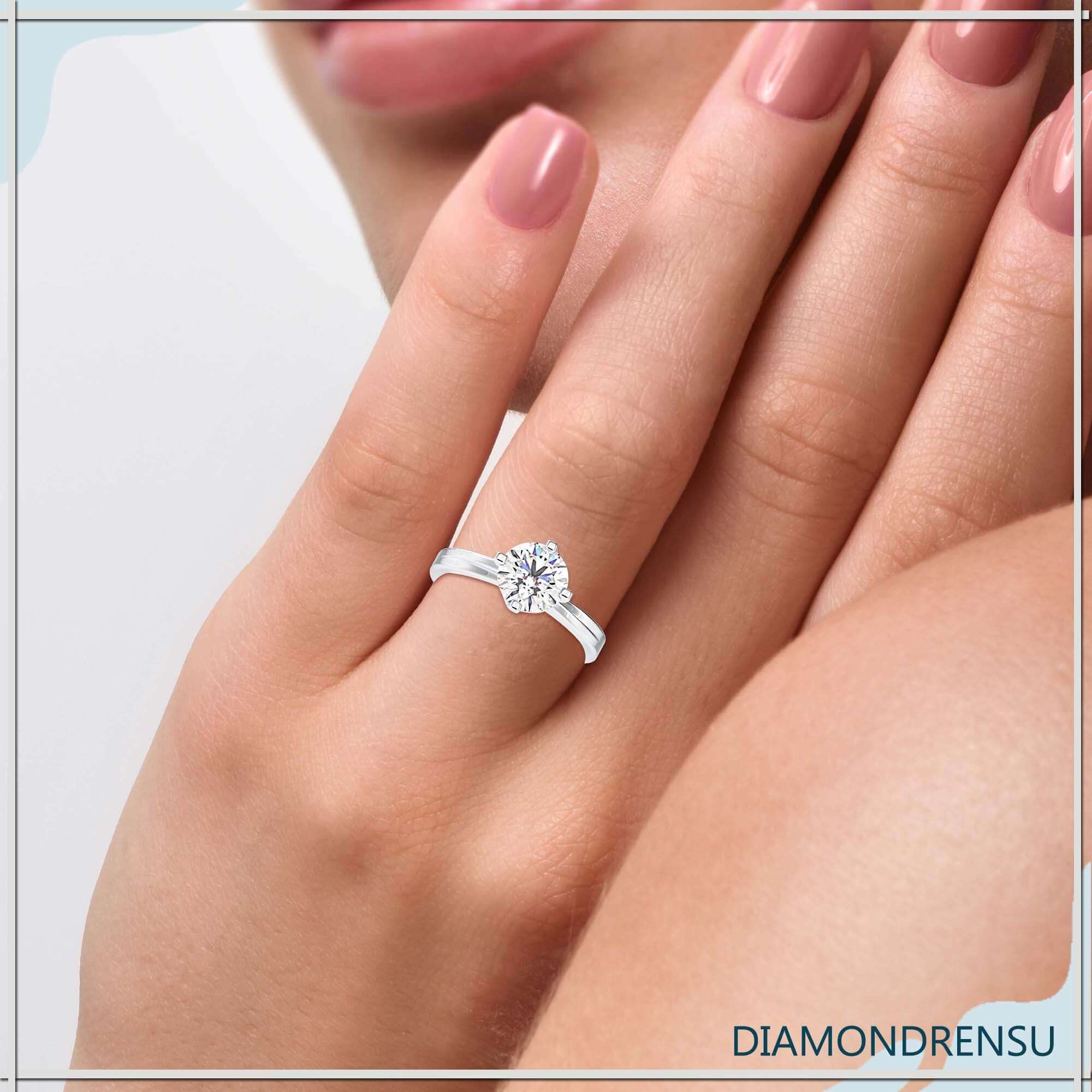 2 carat round diamond ring with a brilliant cut for added sparkle.
