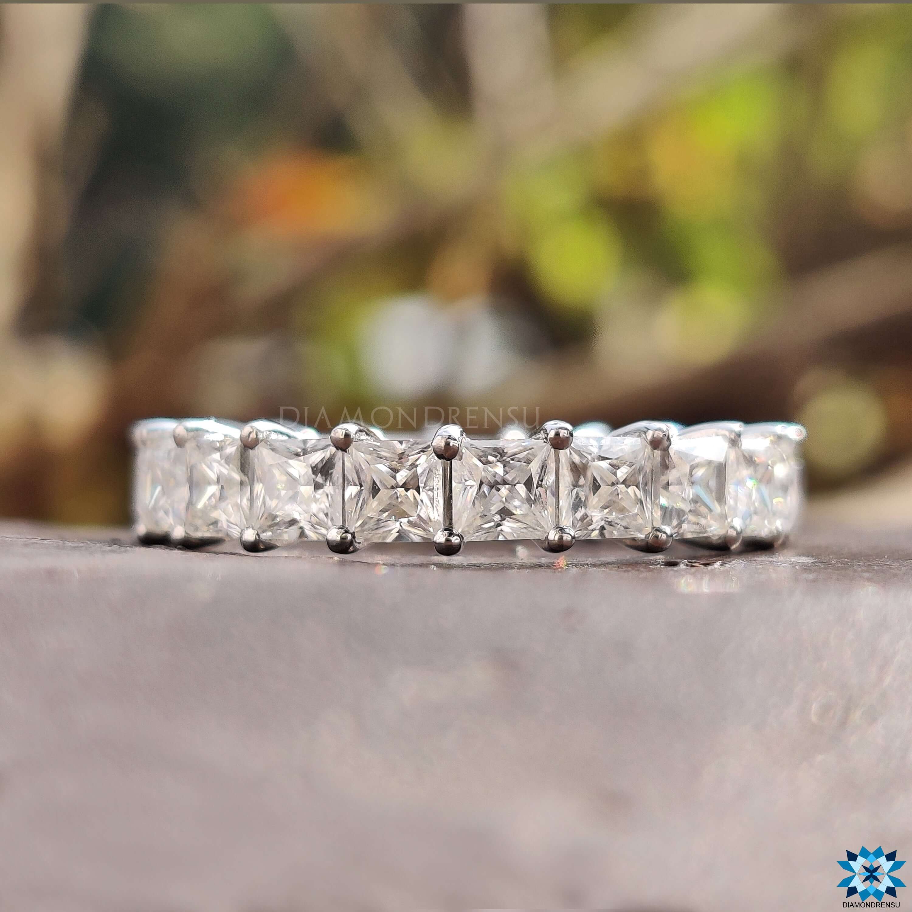 Classic princess cut wedding band with 1.79 CT moissanite stones, offering timeless elegance.