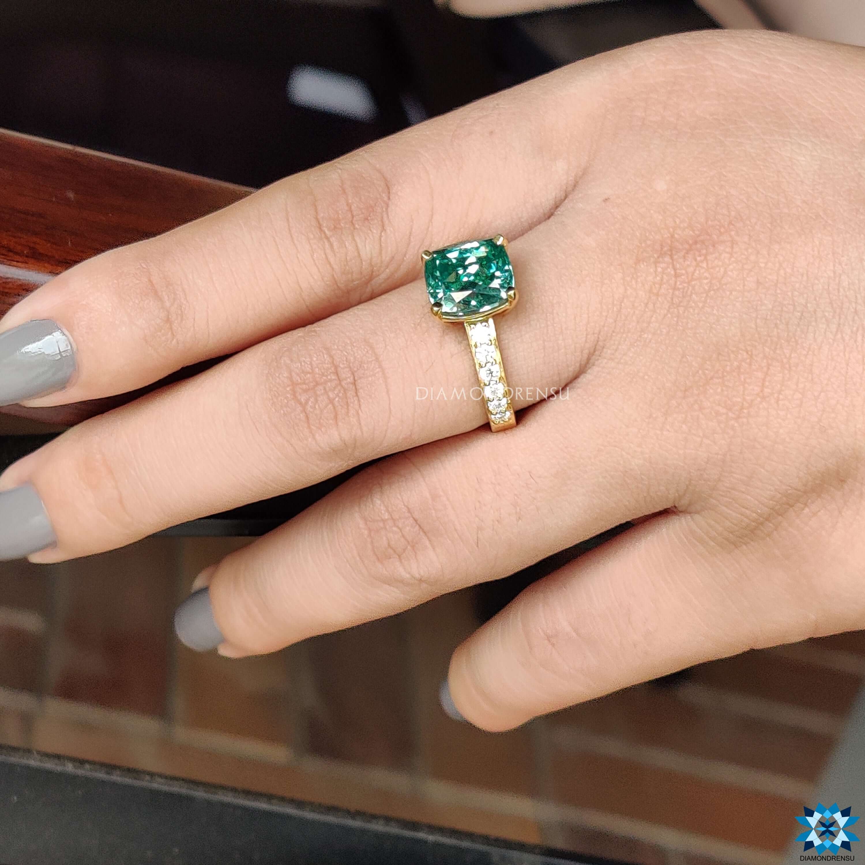 green moissanite ring