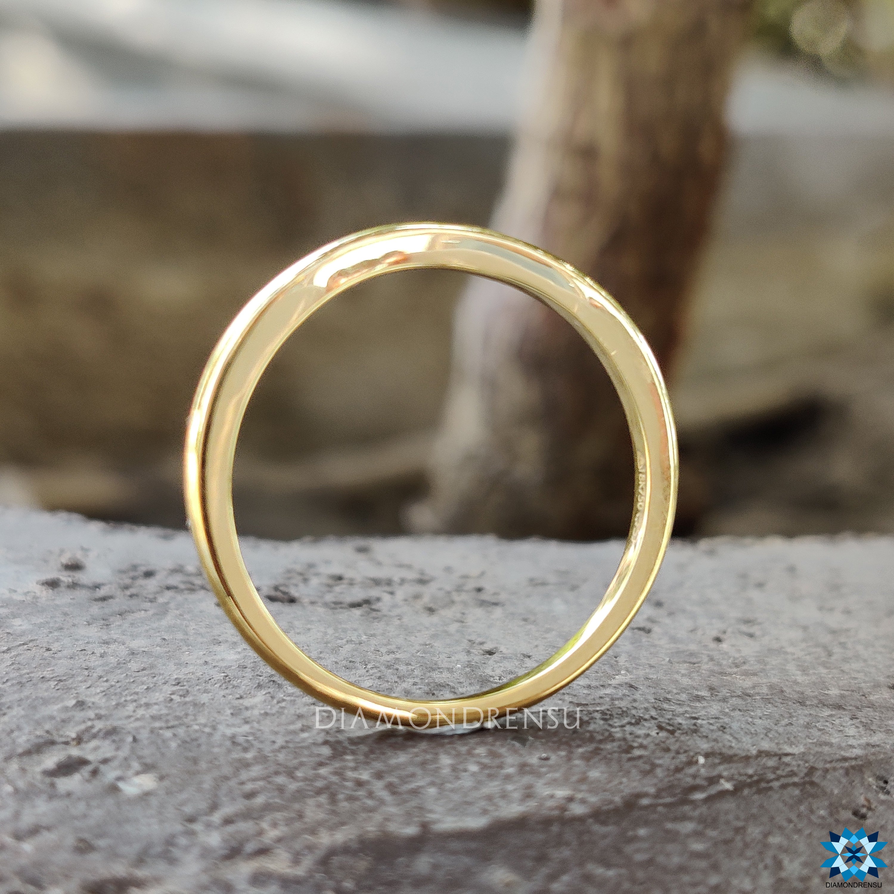 Curved gold wedding band, handmade to perfection for a unique look.