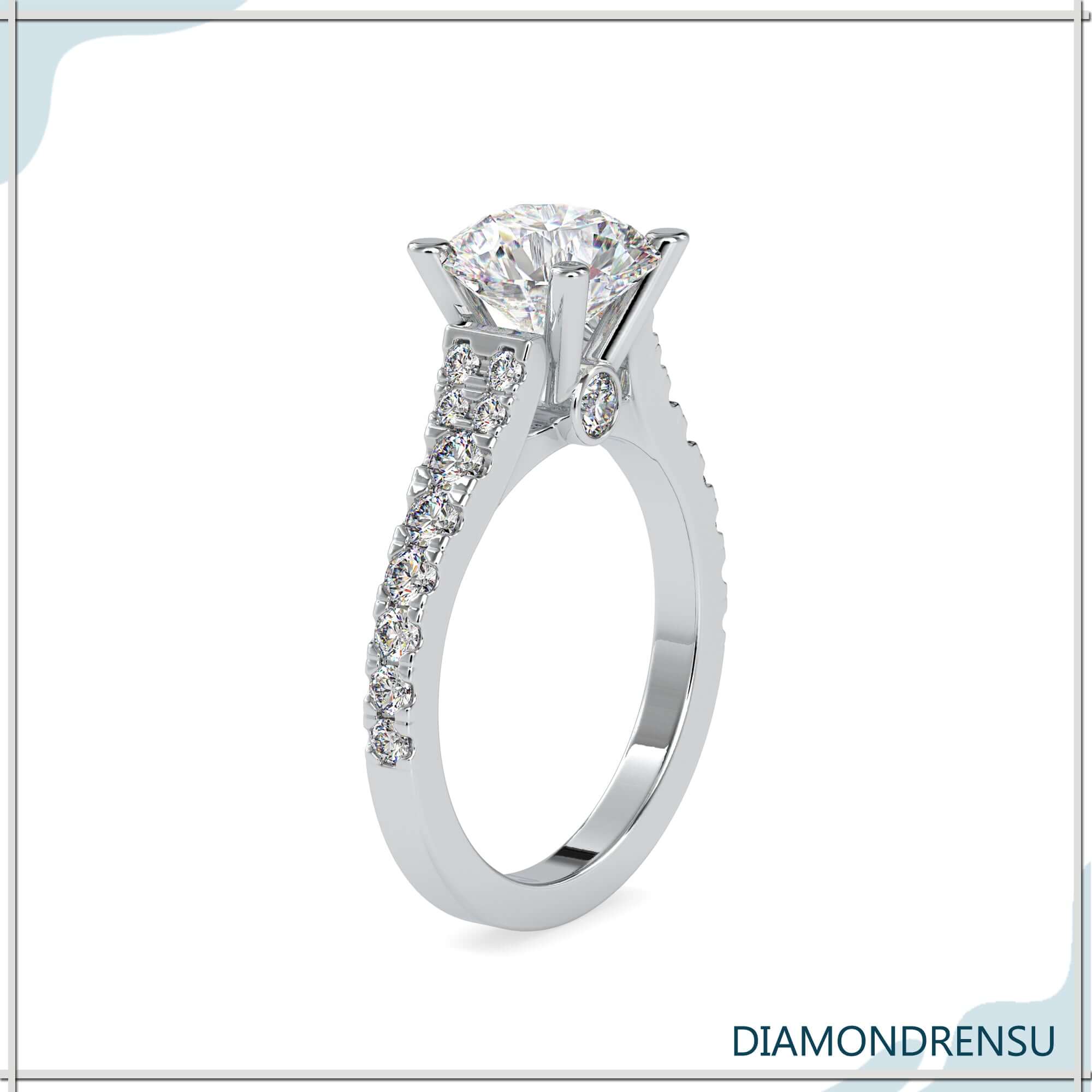 1 carat round diamond ring in a handmade pave ring setting
