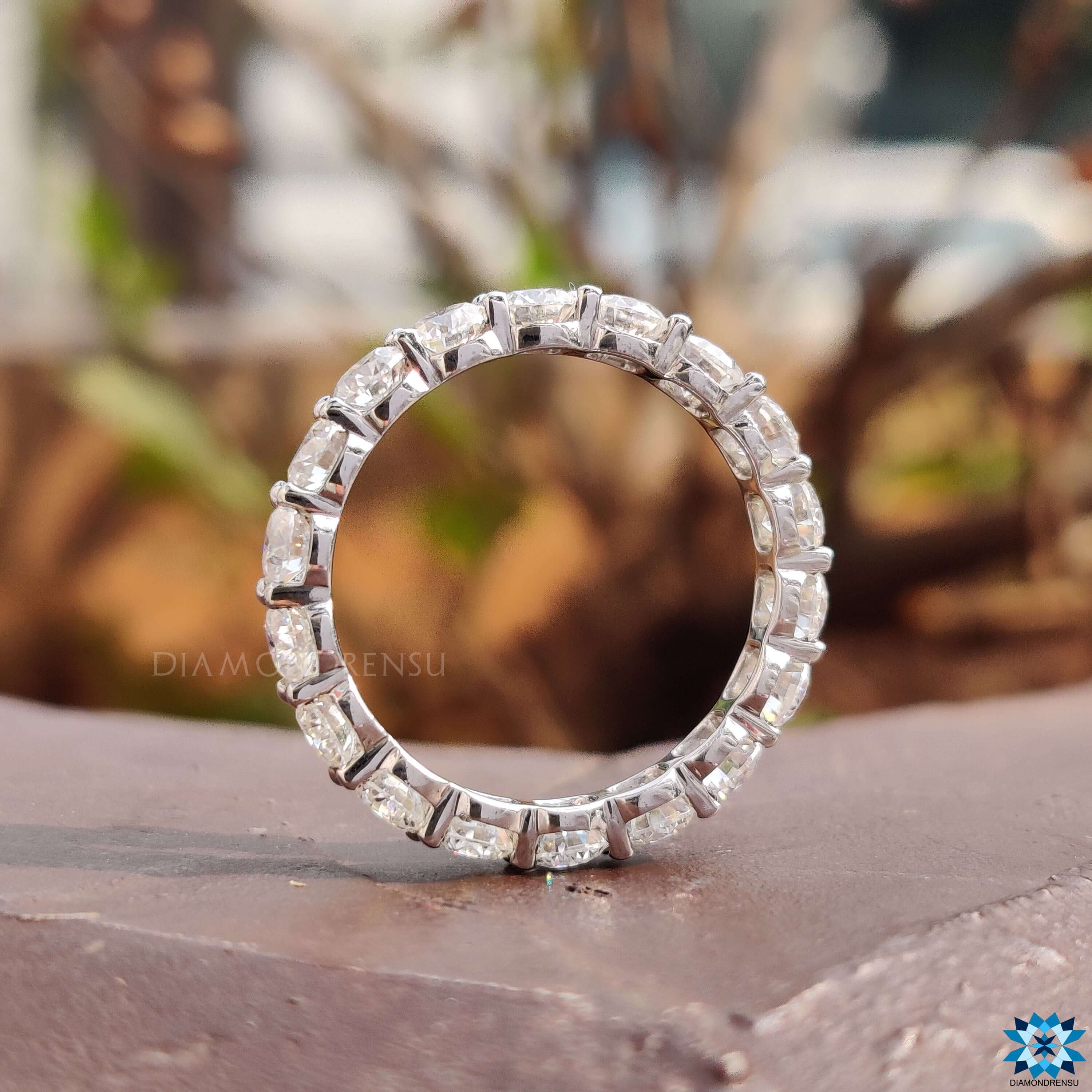 Eternity wedding band crafted with high-quality round cut stones and secure eternity band settings.