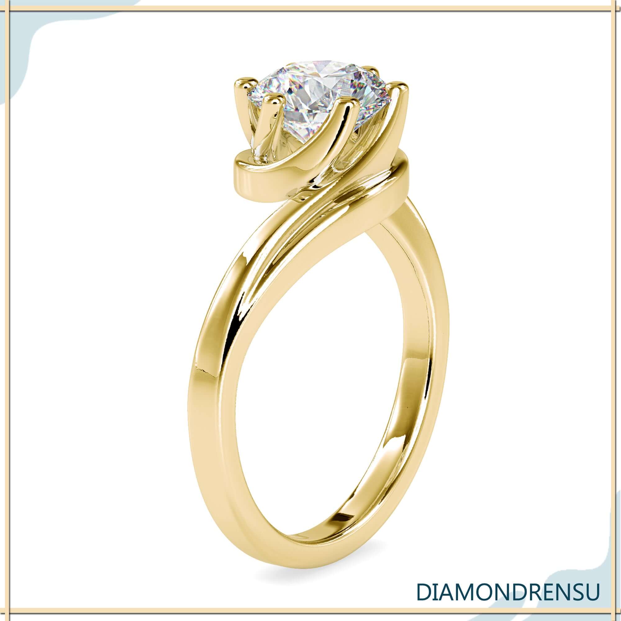 Stunning solitaire ring in a bypass design, perfect for engagements.