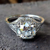 Art Deco engagement ring with intricate detailing, showcasing a stunning vintage design.
