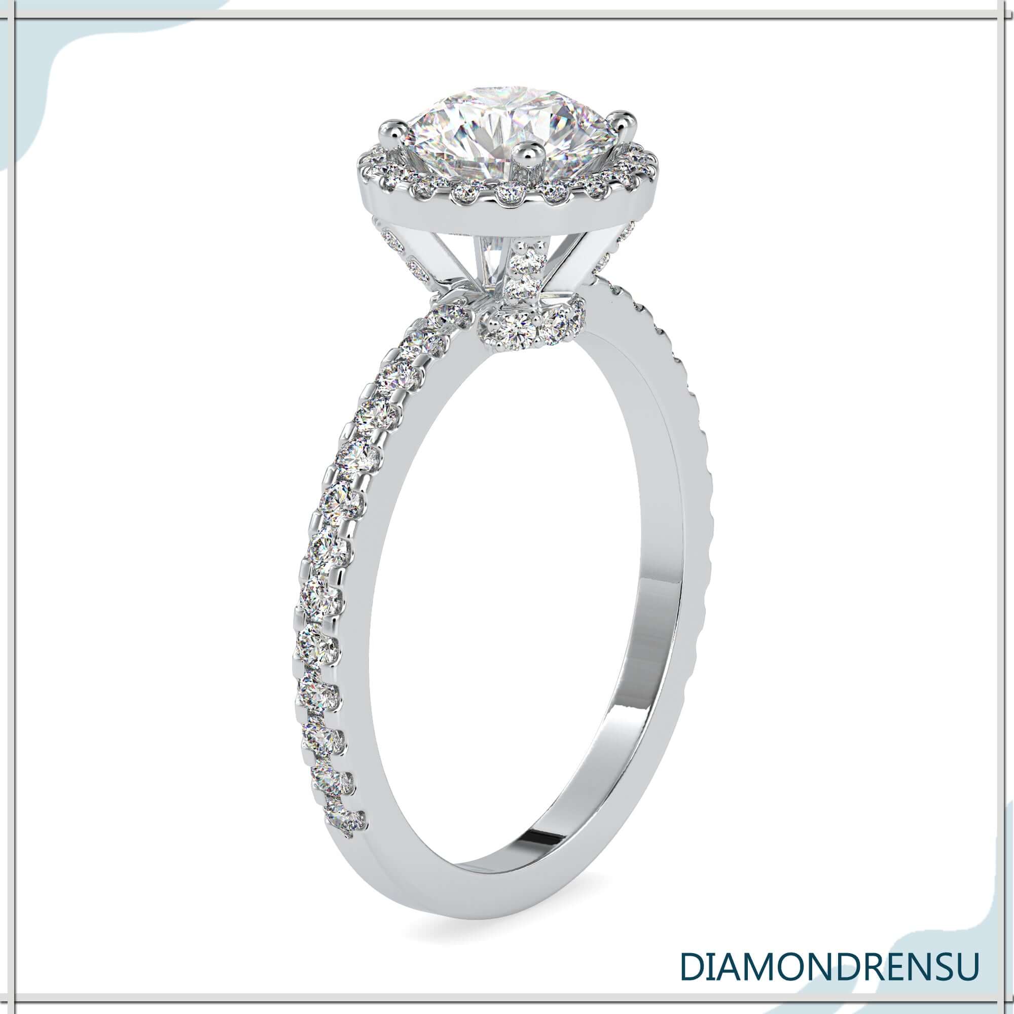 Round halo diamond in a handmade engagement ring design.