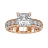 Princess cut engagement ring with sparkling diamonds in a pave setting.
