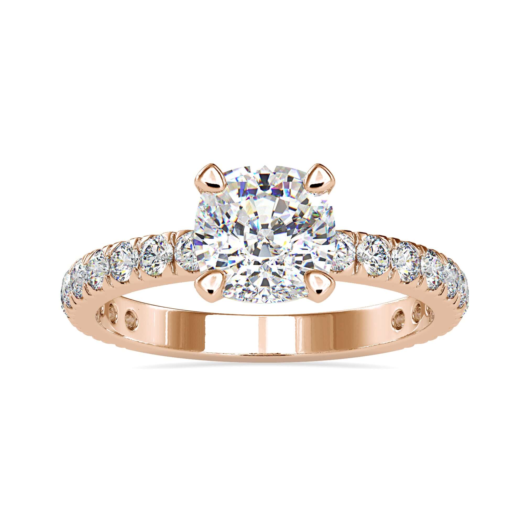 Lab grown diamond cushion engagement ring with a claw prong and basket setting.
