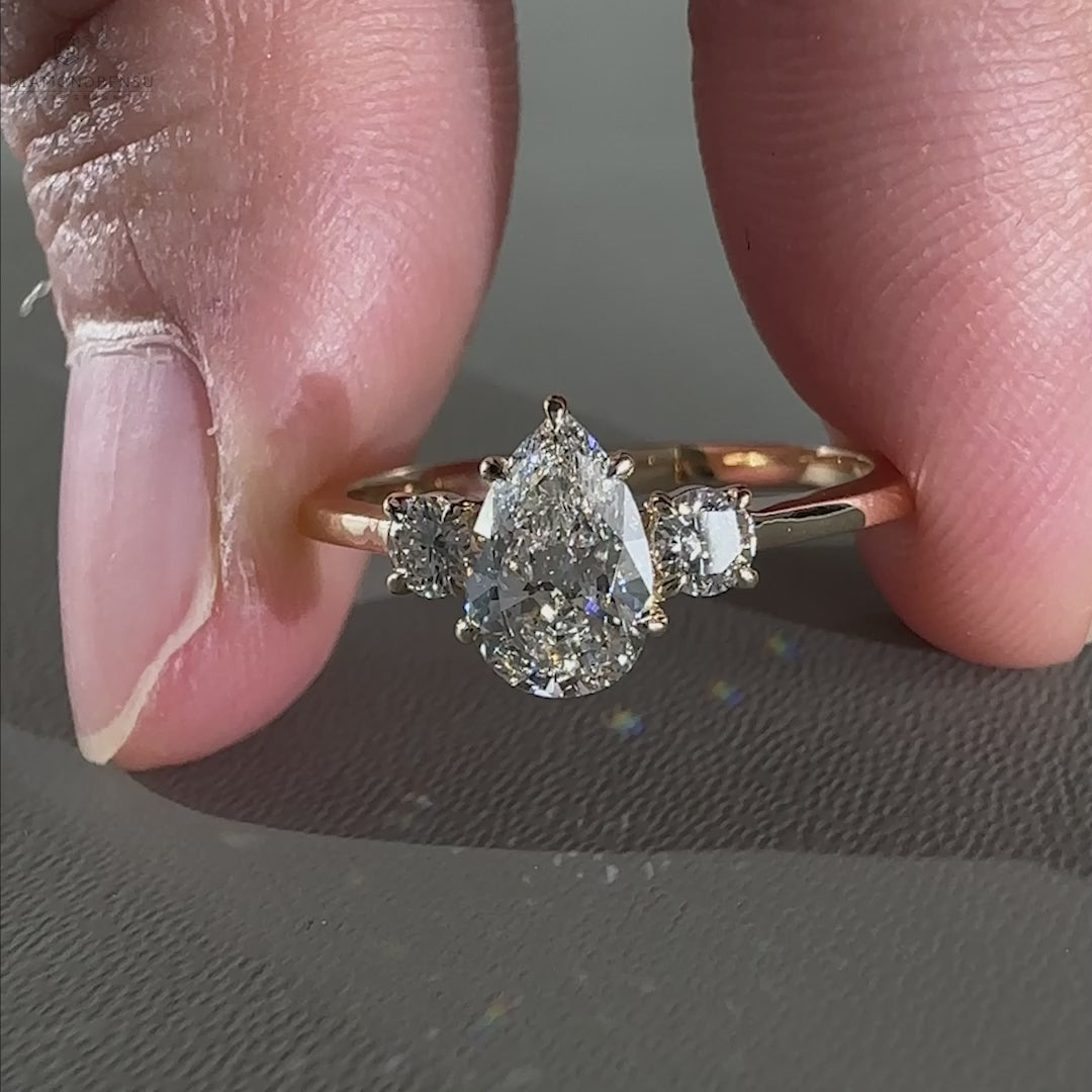 Pear and Round Three Stone Lab Grown Diamond Engagement Ring