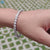 Dazzling 4.0 MM Round Moissanite Four Prong Tennis Bracelet