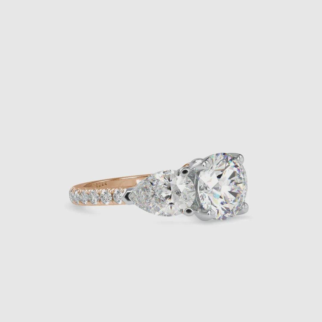 Round And Pear Diamond Ring