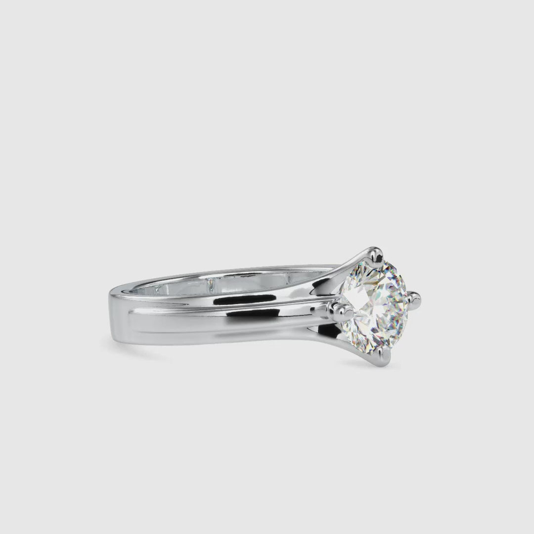 Round Solitaire Ring with Elegant Compass Setting Design