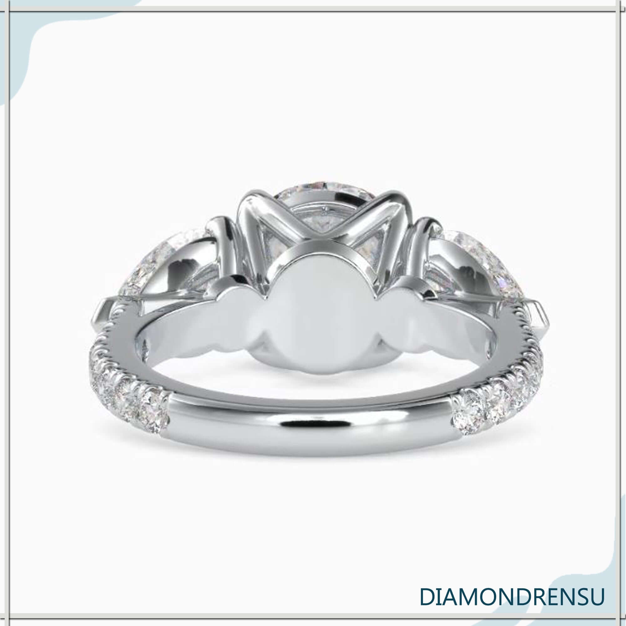 Pear and round diamond ring with a classic cathedral setting