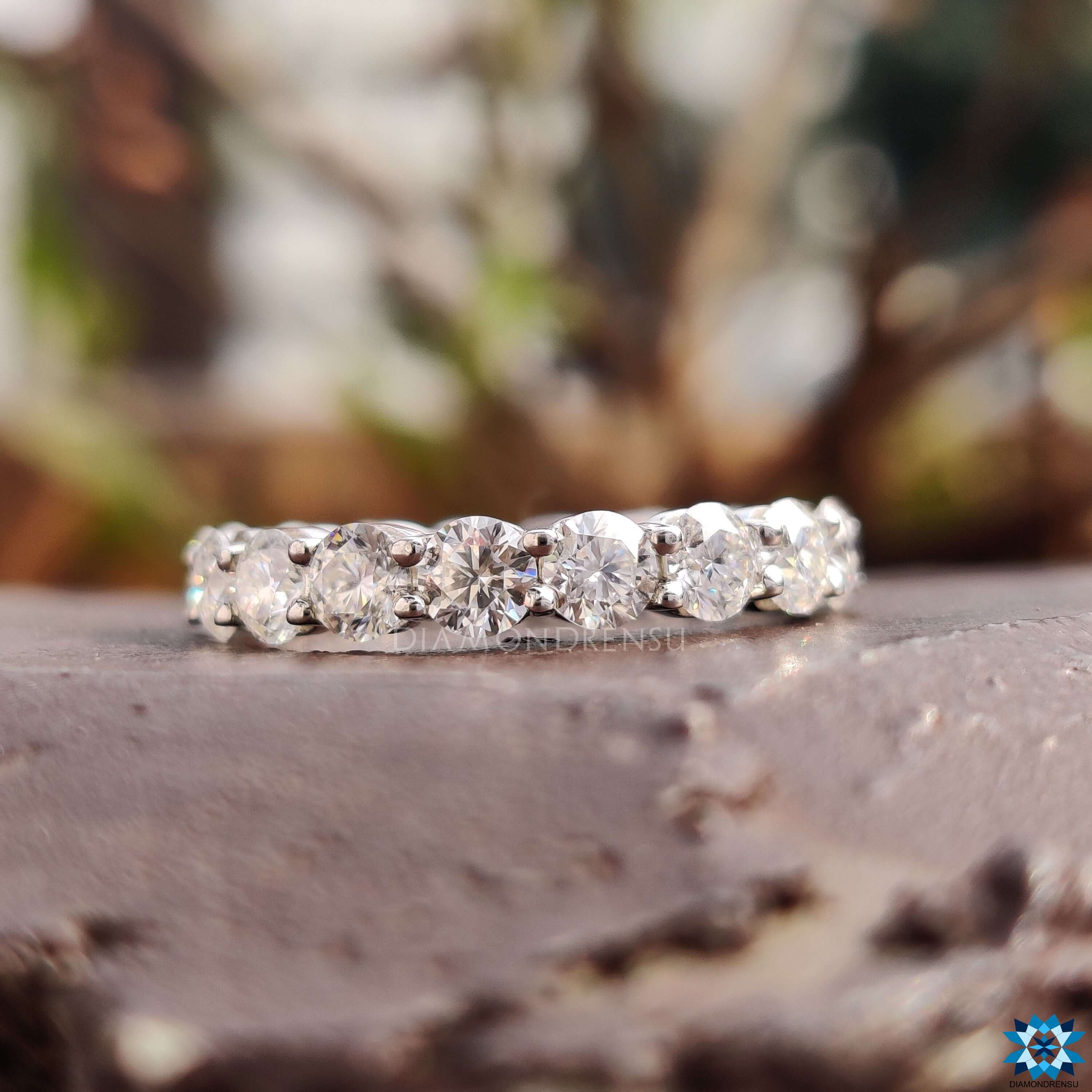 Eternity band round in a basket setting for a modern yet timeless appearance.