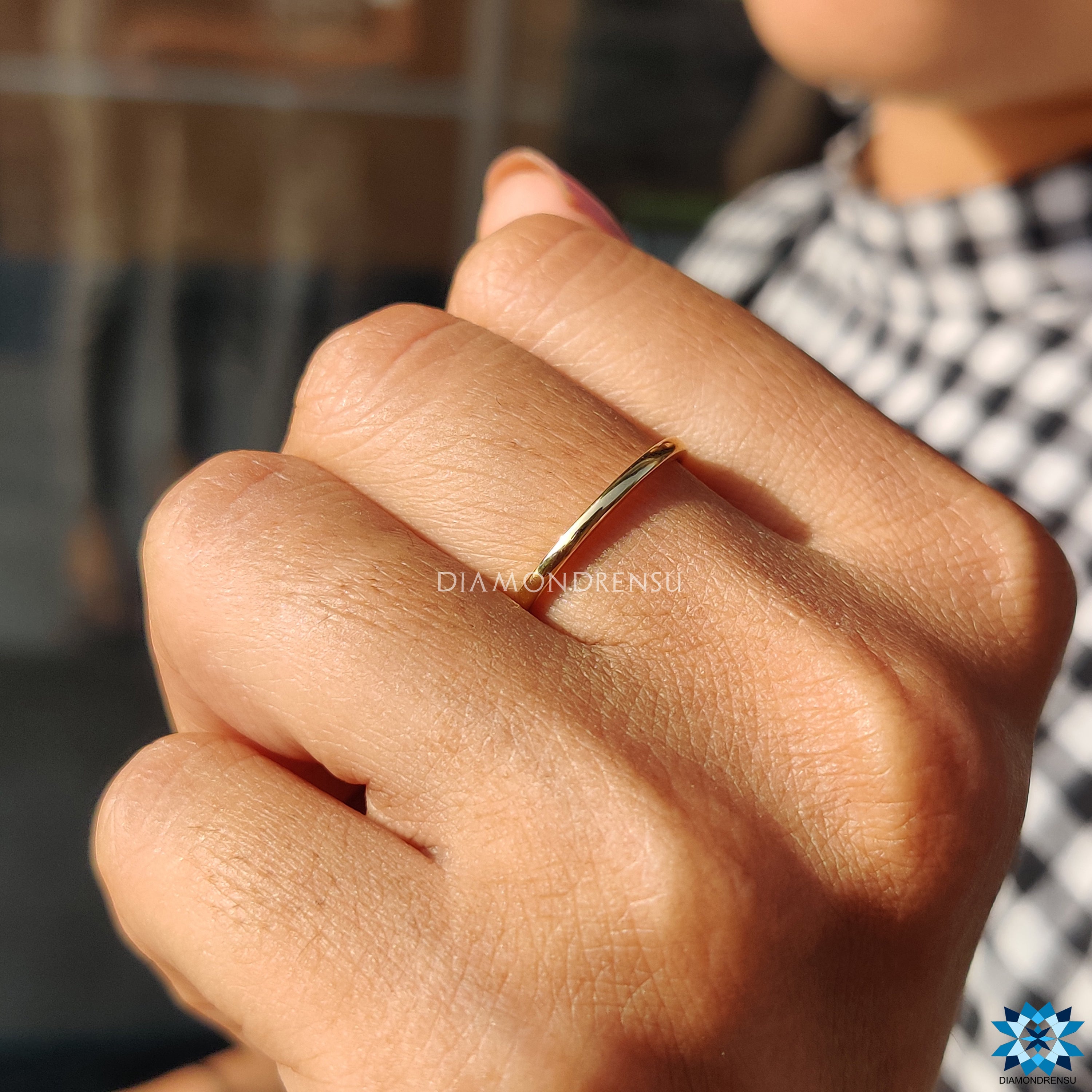 Simple gold band showcasing understated elegance.